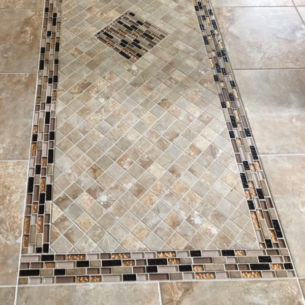 Mosaic tile accent wall in Fayetteville NC bathroom